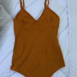 Mustard color body suit